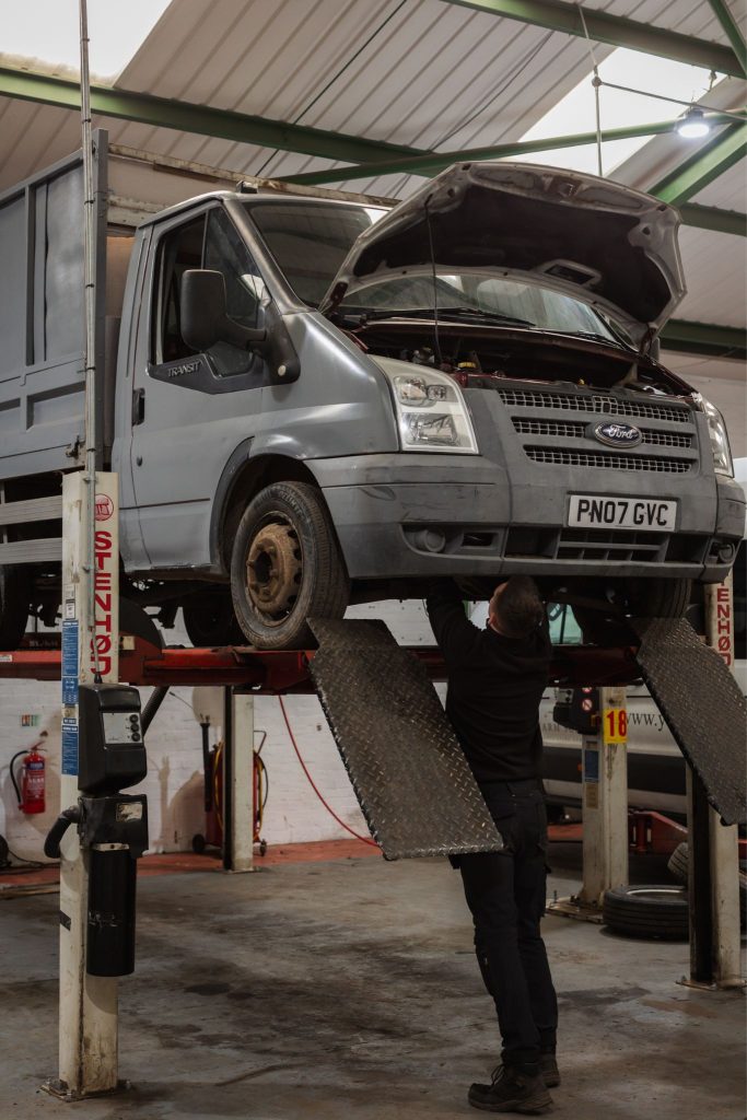Silver van on ramp inside Johnson's garage in Stockton-on-Tees